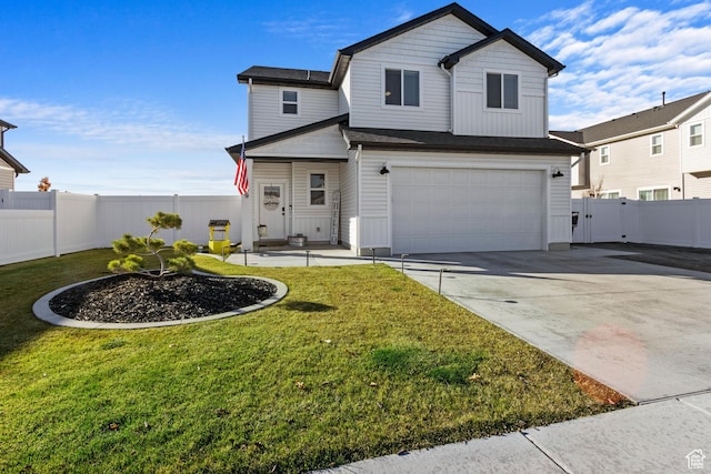 889 N 900 W, Tremonton, UT 84337 - traditional-style home featuring an attached garage, fence, a front yard, and concrete driveway