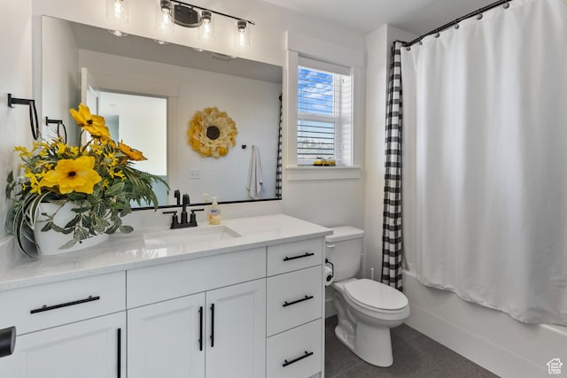 889 N 900 W, Tremonton, UT 84337 - bathroom featuring vanity, shower / tub combo, tile patterned floors, and toilet