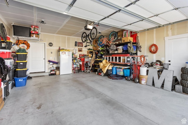 889 N 900 W, Tremonton, UT 84337 - garage featuring a garage door opener