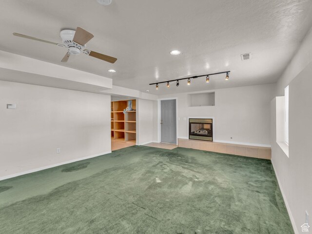 1788 W Nobility Cir, Salt Lake City, UT 84116 - unfurnished living room featuring a ceiling fan, a fireplace, carpet floors, baseboards, and recessed lighting