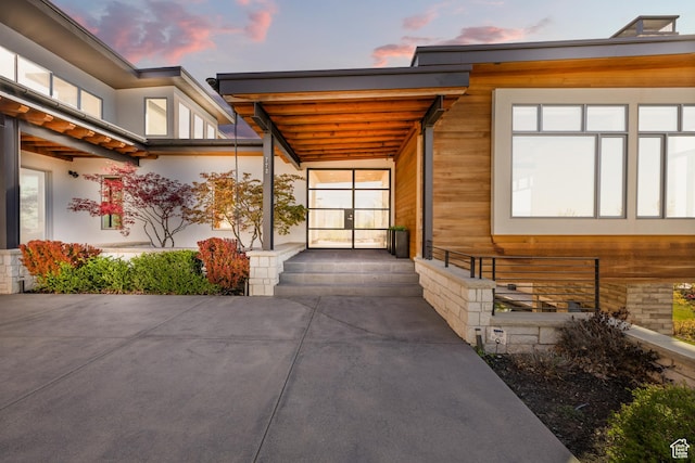 772 S Summit Creek Dr, Woodland Hills, UT 84653 - property exterior at dusk featuring stucco siding