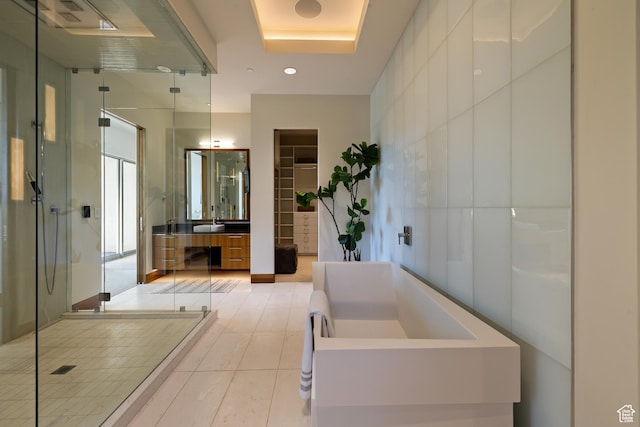 772 S Summit Creek Dr, Woodland Hills, UT 84653 - full bath with a shower stall, vanity, tile patterned floors, a walk in closet, and a bathtub