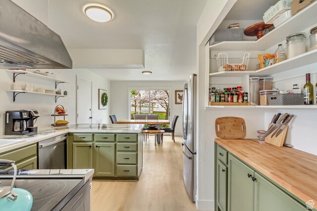 584 E Aspen Way, Centerville, UT 84014 - kitchen featuring open shelves, butcher block countertops, range hood, appliances with stainless steel finishes, and green cabinets