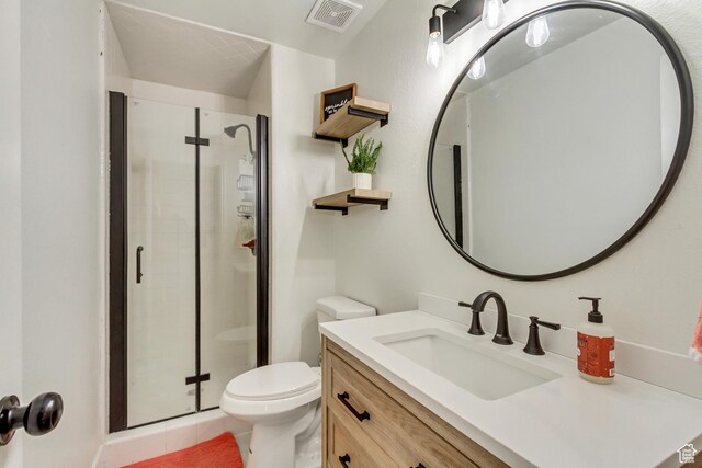 584 E Aspen Way, Centerville, UT 84014 - bathroom with vanity, toilet, visible vents, and a stall shower