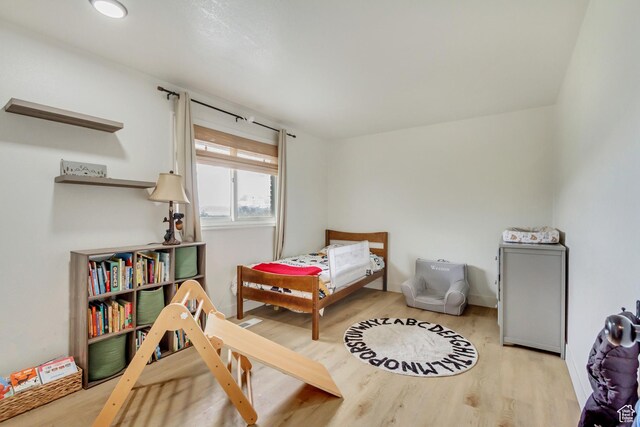 584 E Aspen Way, Centerville, UT 84014 - bedroom featuring wood finished floors