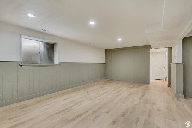584 E Aspen Way, Centerville, UT 84014 - finished basement with recessed lighting, visible vents, a wainscoted wall, and light wood-style floors