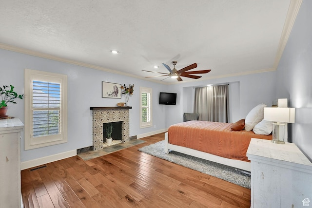5078 S Iroquois Way E, Ogden, UT 84403 - bedroom featuring visible vents, ornamental molding, baseboards, and wood-type flooring