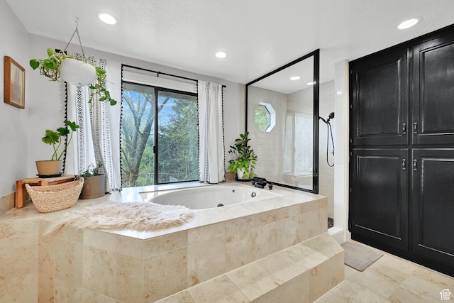 5078 S Iroquois Way E, Ogden, UT 84403 - full bath featuring a walk in shower, recessed lighting, and a bath