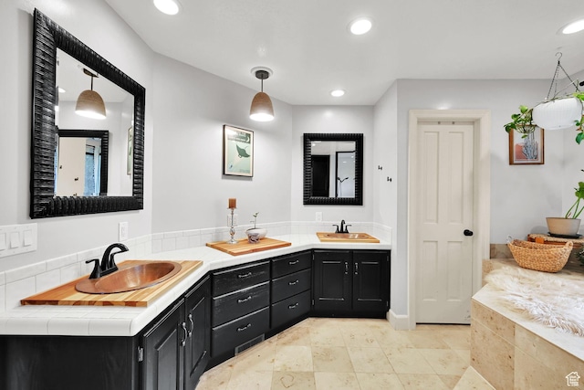 5078 S Iroquois Way E, Ogden, UT 84403 - bathroom featuring a sink, recessed lighting, and double vanity