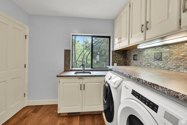 5078 S Iroquois Way E, Ogden, UT 84403 - clothes washing area featuring washer and dryer, cabinet space, a sink, dark wood finished floors, and baseboards