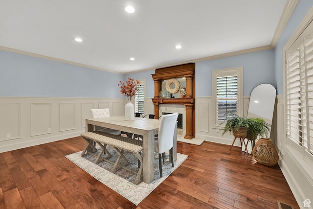 5078 S Iroquois Way E, Ogden, UT 84403 - dining space with crown molding, dark wood-style floors, and a wainscoted wall