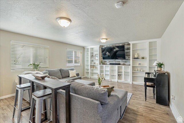 204 E 460 N, Vineyard, UT 84059 - living area with baseboards, a textured ceiling, and wood finished floors