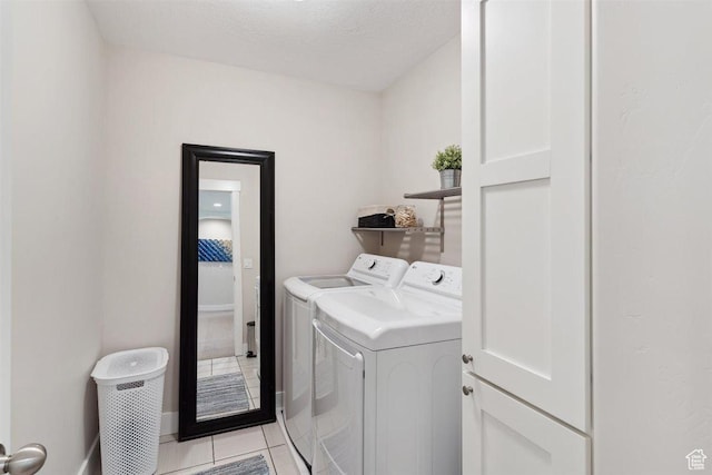 1485 E Peachtree Ln, Fruit Heights, UT 84037 - clothes washing area with laundry area, washer and clothes dryer, and light tile patterned floors