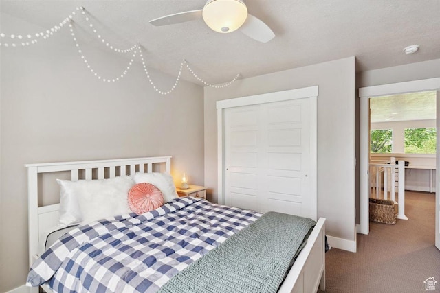 1485 E Peachtree Ln, Fruit Heights, UT 84037 - carpeted bedroom with baseboards, a ceiling fan, and a closet