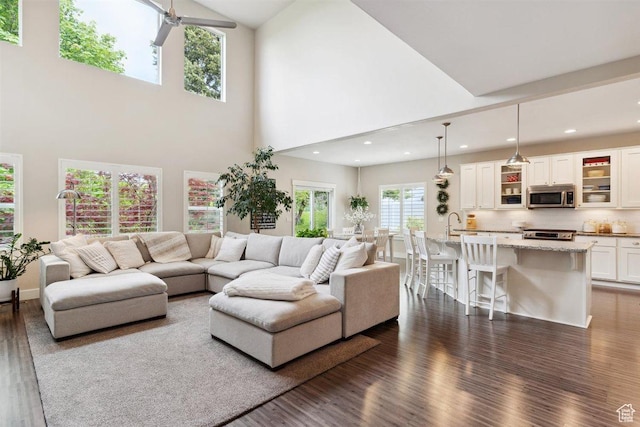 1485 E Peachtree Ln, Fruit Heights, UT 84037 - living room featuring recessed lighting, dark wood-style flooring, and a high ceiling