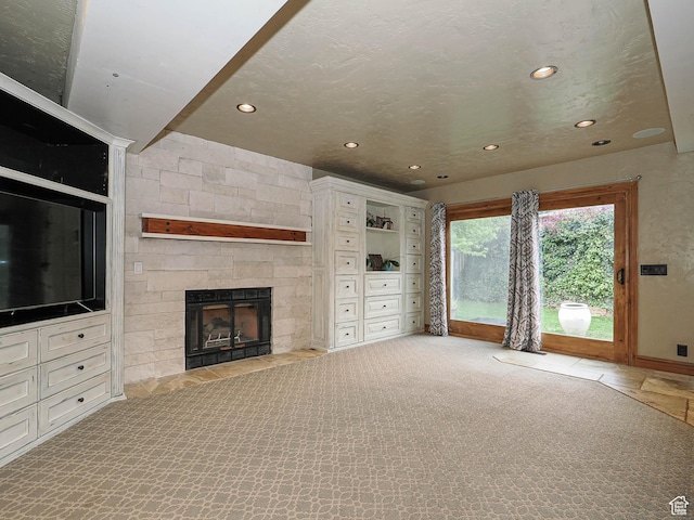 418 E Bridlewalk Ln, Murray, UT 84107 - unfurnished living room with recessed lighting, baseboards, carpet floors, and a fireplace