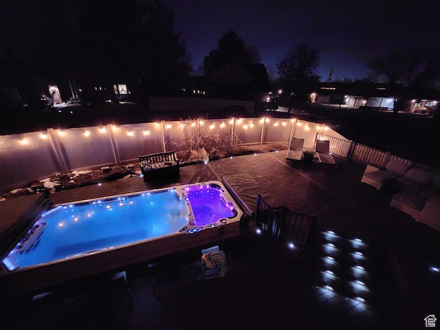418 E Bridlewalk Ln, Murray, UT 84107 - pool at twilight featuring a jacuzzi