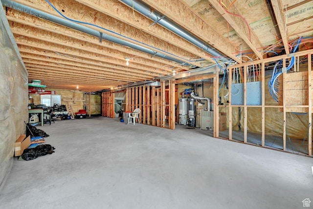 6272 S Lake Fork Cir, Taylorsville, UT 84129 - unfinished basement featuring water heater and heating unit