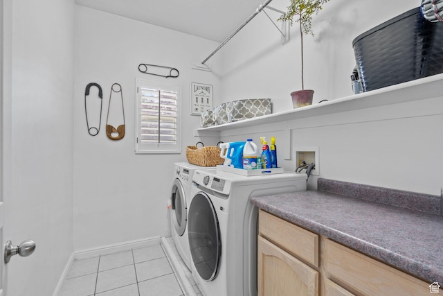 6272 S Lake Fork Cir, Taylorsville, UT 84129 - clothes washing area with light tile patterned floors, baseboards, laundry area, and washer and clothes dryer