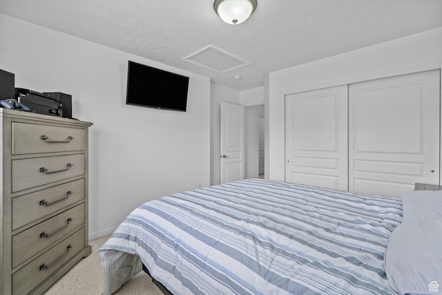 6272 S Lake Fork Cir, Taylorsville, UT 84129 - bedroom with a closet, attic access, baseboards, and light carpet
