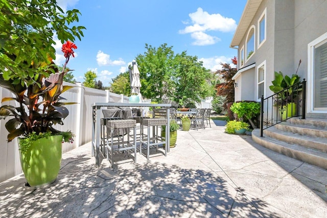 6272 S Lake Fork Cir, Taylorsville, UT 84129 - view of patio with fence and outdoor dining space