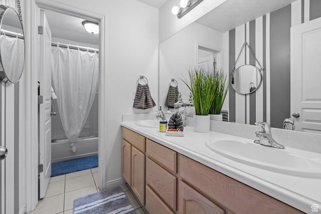 6272 S Lake Fork Cir, Taylorsville, UT 84129 - bathroom featuring double vanity, tile patterned floors, shower / bathtub combination with curtain, and a sink
