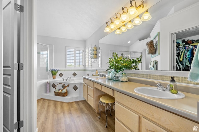 6272 S Lake Fork Cir, Taylorsville, UT 84129 - bathroom featuring double vanity, a sink, a bath, and a stall shower