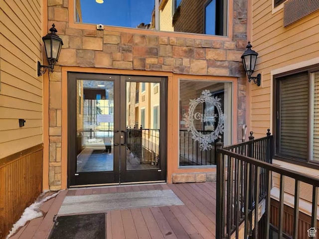 1940 Prospector Ave Unit 207, Park City, UT 84060 - entrance to property with a wooden deck, french doors, and stone siding