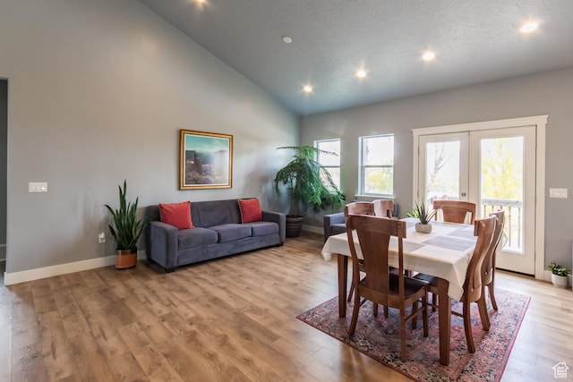 1428 N 4075 W, Vernal, UT 84078 - dining area featuring light wood-style floors, baseboards, recessed lighting, and high vaulted ceiling