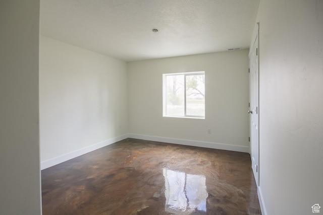 1428 N 4075 W, Vernal, UT 84078 - unfurnished room with baseboards, visible vents, and finished concrete flooring