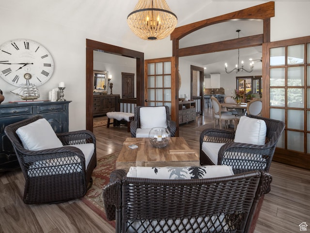 3540 N Elkview Dr, Eden, UT 84310 - living room featuring high vaulted ceiling, an inviting chandelier, and wood finished floors