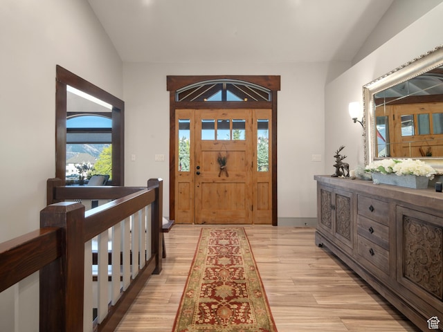 3540 N Elkview Dr, Eden, UT 84310 - foyer entrance with light wood-style floors and lofted ceiling