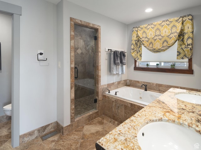 3540 N Elkview Dr, Eden, UT 84310 - bathroom featuring a sink, double vanity, a shower stall, visible vents, and a garden tub