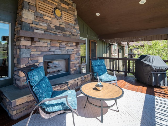 3540 N Elkview Dr, Eden, UT 84310 - view of patio with a wooden deck, a grill, and an outdoor stone fireplace