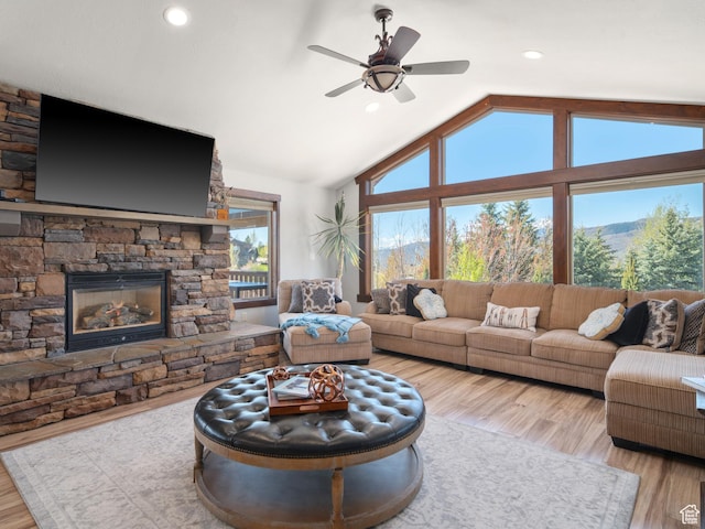 3540 N Elkview Dr, Eden, UT 84310 - living area with a fireplace, a ceiling fan, recessed lighting, wood finished floors, and lofted ceiling