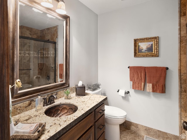3540 N Elkview Dr, Eden, UT 84310 - full bath with vanity, toilet, tile patterned floors, baseboards, and a shower stall