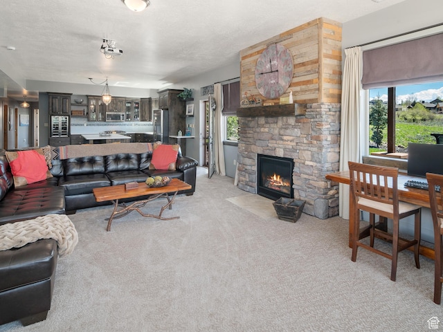 3540 N Elkview Dr, Eden, UT 84310 - living room with a fireplace and light carpet