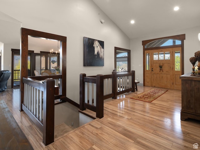 3540 N Elkview Dr, Eden, UT 84310 - entrance foyer featuring recessed lighting, high vaulted ceiling, a chandelier, and wood finished floors