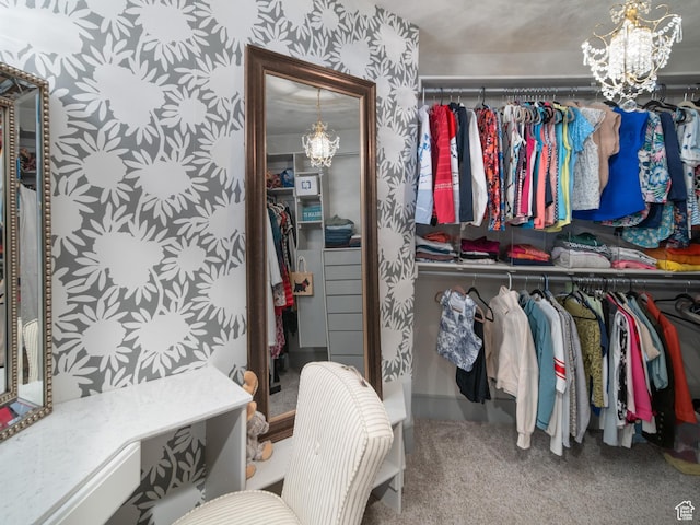 3540 N Elkview Dr, Eden, UT 84310 - walk in closet with carpet flooring and a chandelier