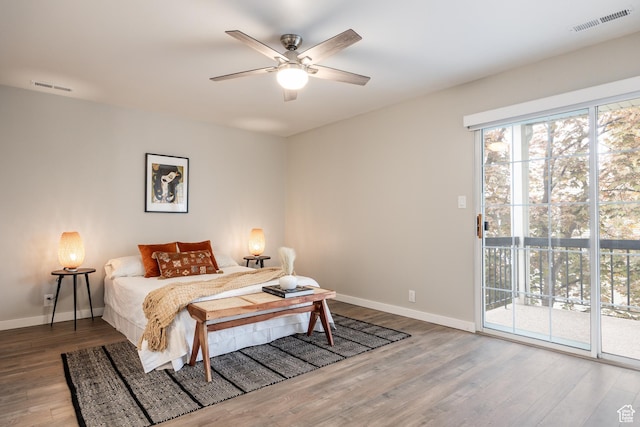 636 E 3990 S Unit D, Millcreek, UT 84107 - bedroom featuring visible vents, baseboards, wood finished floors, and access to exterior