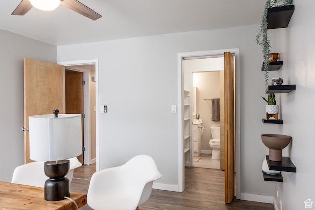 636 E 3990 S Unit D, Millcreek, UT 84107 - living area with baseboards, ceiling fan, and dark wood-style flooring