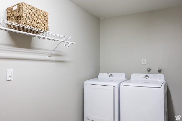 636 E 3990 S Unit D, Millcreek, UT 84107 - laundry area featuring laundry area and washer and clothes dryer