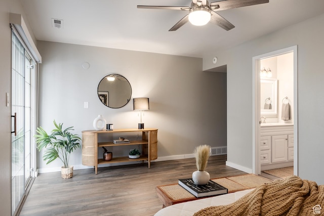 636 E 3990 S Unit D, Millcreek, UT 84107 - living area with a ceiling fan, baseboards, visible vents, and wood finished floors