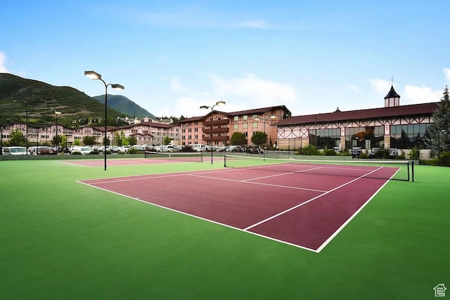 784 Resort Dr Unit 136, Midway, UT 84049 - view of sport court with community basketball court, fence, and a mountain view