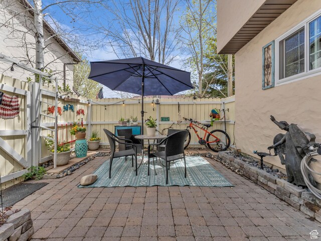 181 Geneva Dr, Midway, UT 84049 - view of patio / terrace with outdoor dining area and a fenced backyard