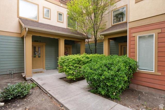 1026 N Shepard Pkwy Unit 3, Farmington, UT 84025 - doorway to property featuring a porch and stucco siding