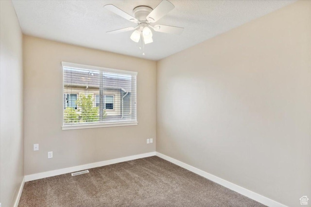 1026 N Shepard Pkwy Unit 3, Farmington, UT 84025 - spare room featuring carpet, visible vents, baseboards, and a ceiling fan