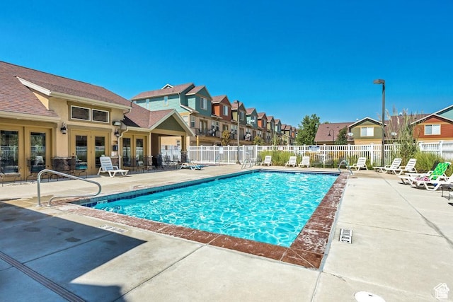 1026 N Shepard Pkwy Unit 3, Farmington, UT 84025 - pool featuring fence, french doors, a patio area, and a residential view