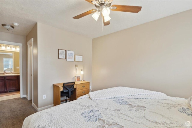1026 N Shepard Pkwy Unit 3, Farmington, UT 84025 - bedroom with connected bathroom, carpet floors, a ceiling fan, and baseboards