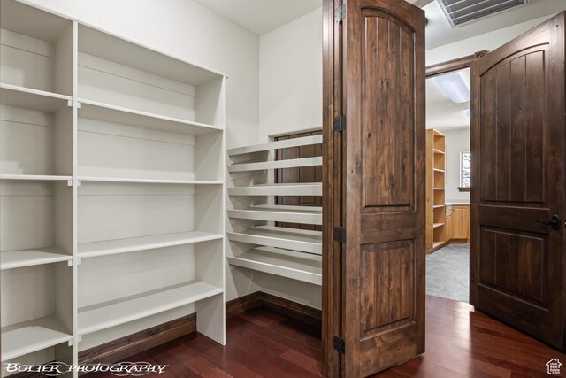 1328 N Parkside Dr, Cedar City, UT 84721 - walk in closet with visible vents and dark wood finished floors